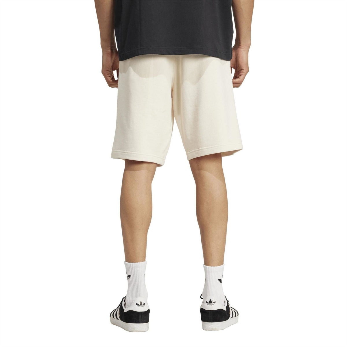 Wonder White Essentials shorts, adidas logo on back, knee-length relaxed fit