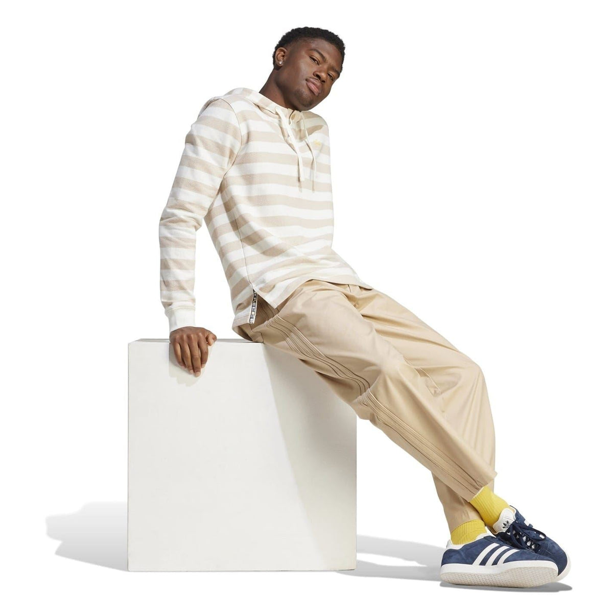 Beige drawstring chinos with neat cuff and side seam detail