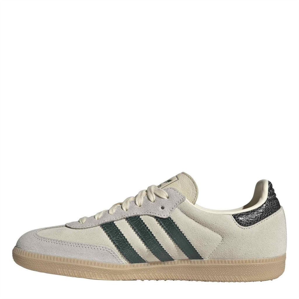 Light gray adidas Samba OG sneakers with three green stripes and beige gum outsole