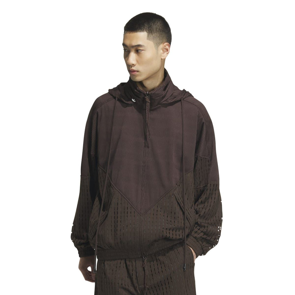 Brown zip-up hooded jacket with textured perforated chevron pattern and elastic cuffs