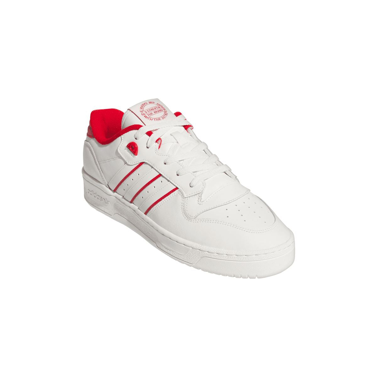 White low-top sneaker with red inner collar and red-striped side paneling.
