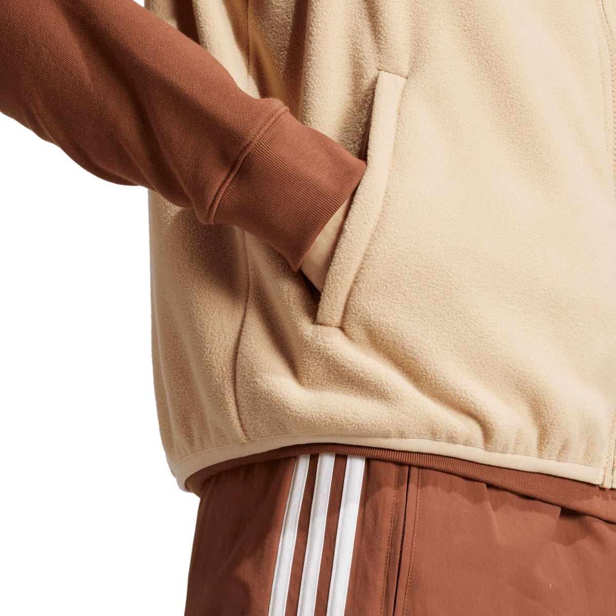 adidas Originals beige microfleece vest hem detail, full-zip front and striped trim