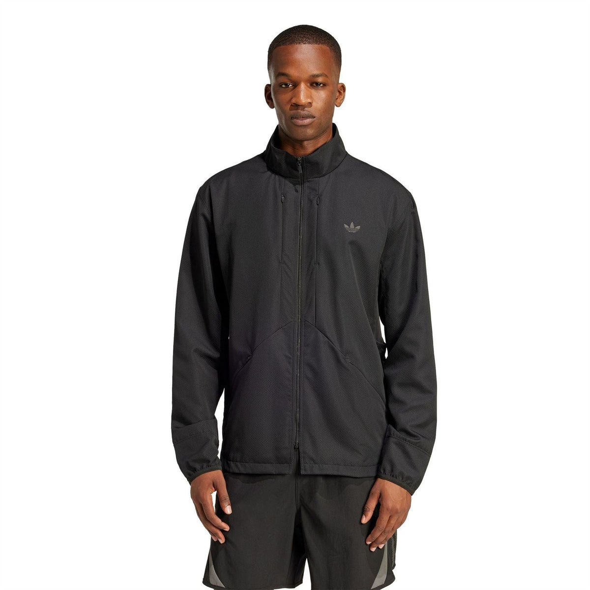 Black hooded windbreaker jacket with full-zip front and small chest logo