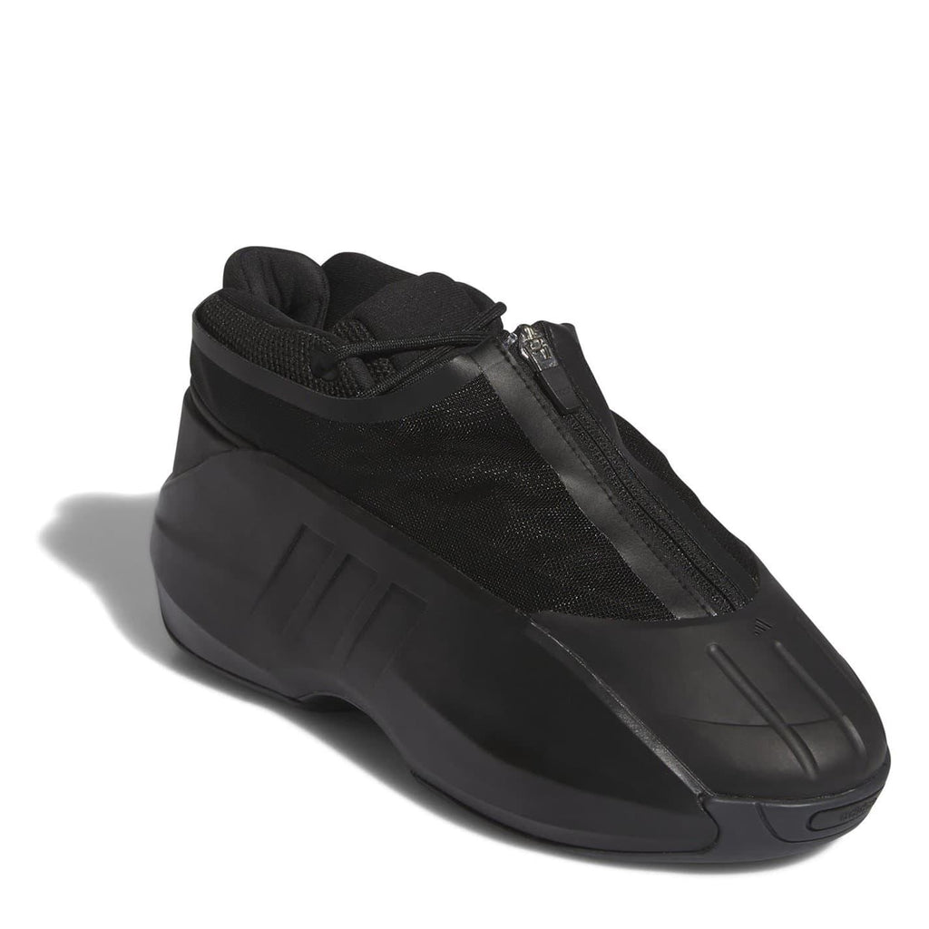Black infant trainers with side zipper, knit upper, and chunky molded sole
