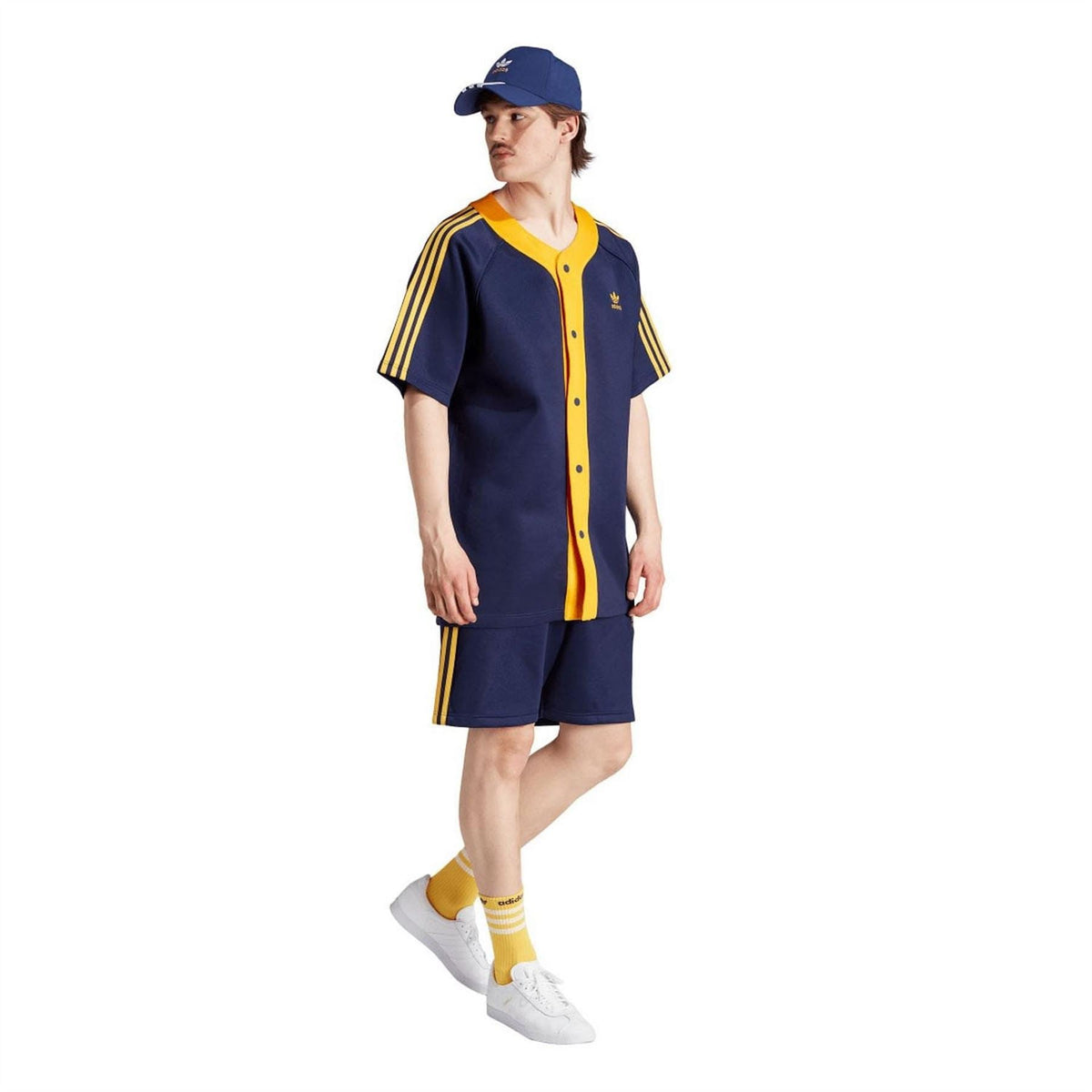 Navy athletic shorts with elastic waist and yellow side stripes, adidas logo