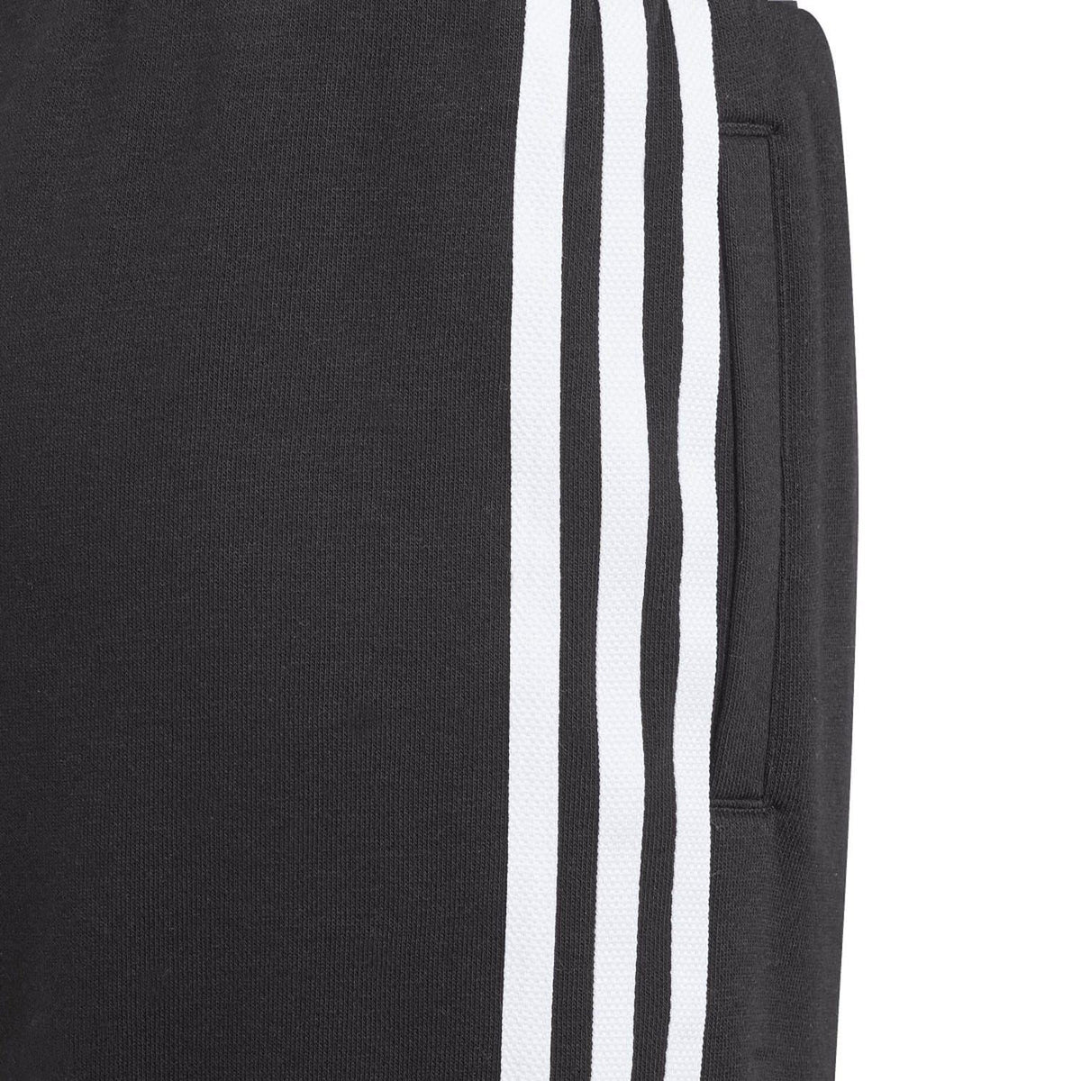 Black shorts fabric close-up with two white side stripe tapes