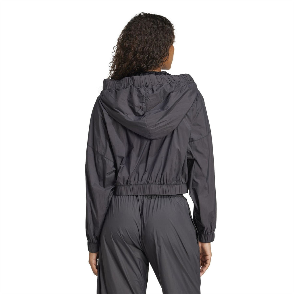 Black ruched hooded bomber jacket viewed from back with elastic waist band
