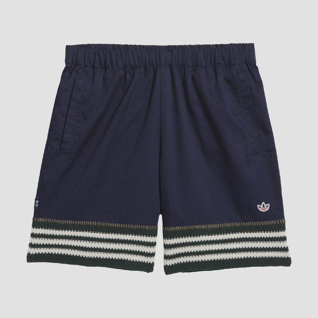 Indigo knit shorts with elastic waistband and striped hem, trefoil logo