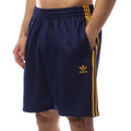 Navy adidas track shorts with elastic waistband, yellow side stripe and small logo