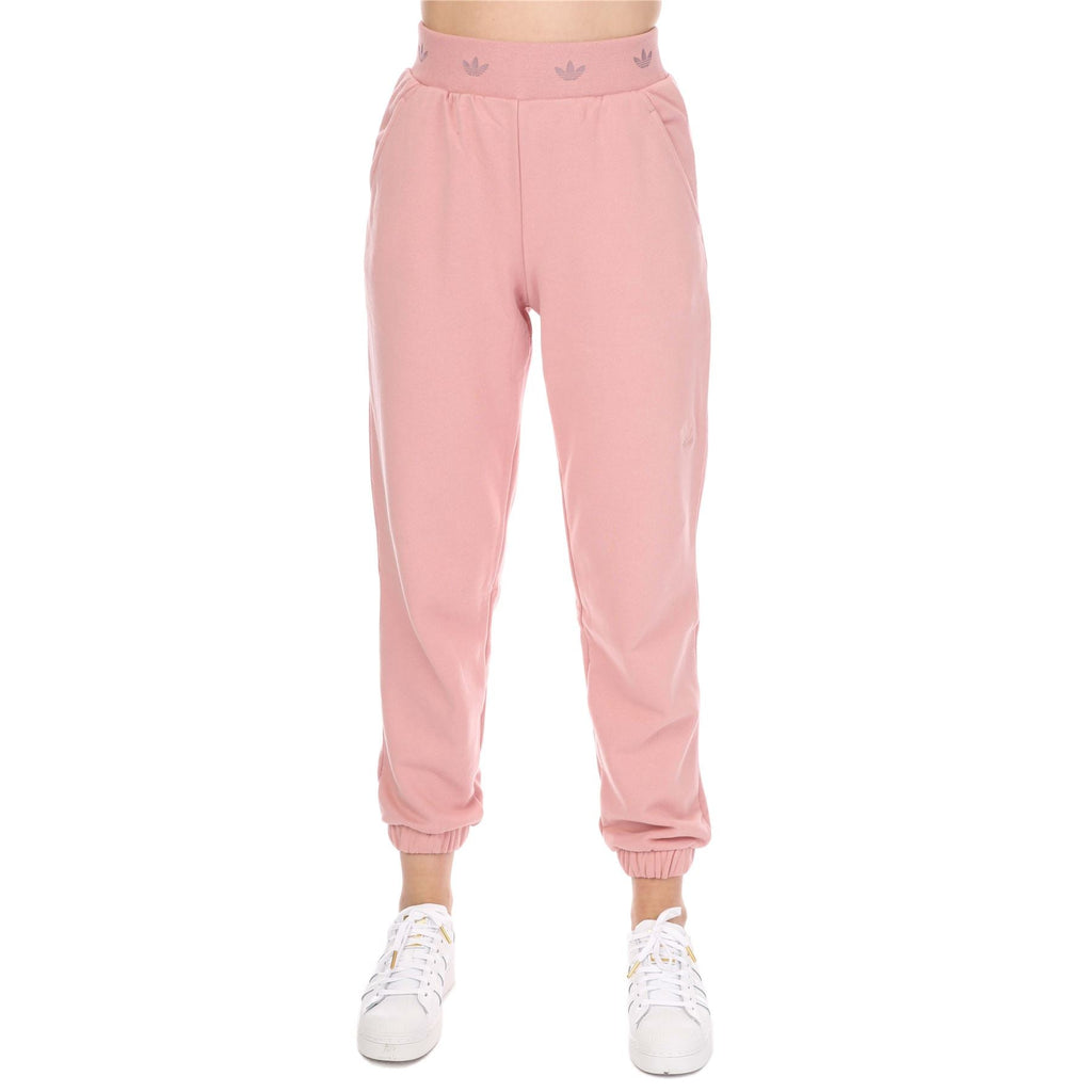 Pink cuffed jogger pants with elastic waistband and side pockets