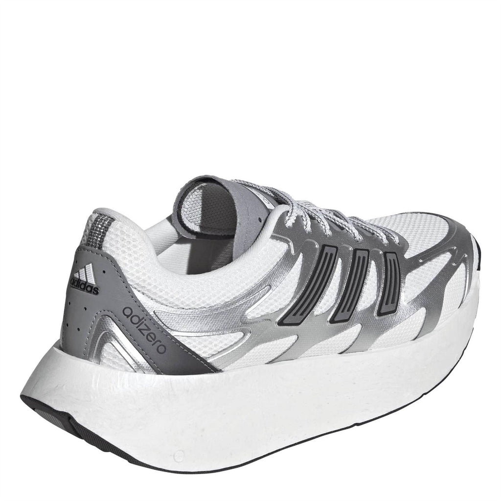 Silver and white lace-up sneakers with padded collar and visible heel and midsole