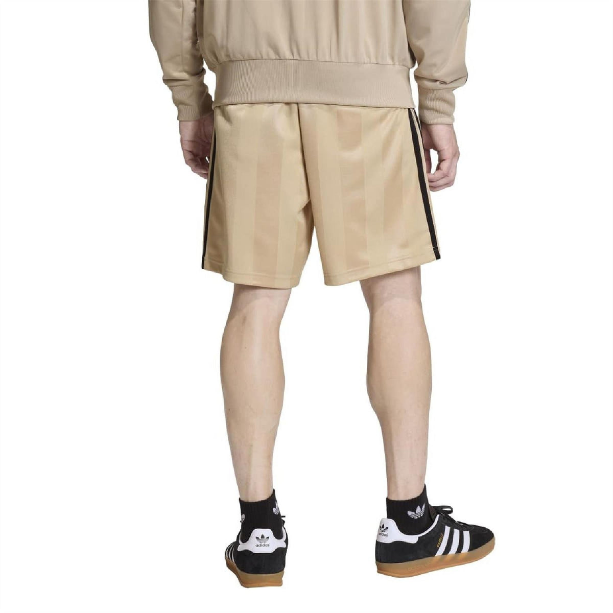Stone khaki loose shorts with black side stripe accents and elastic waistband