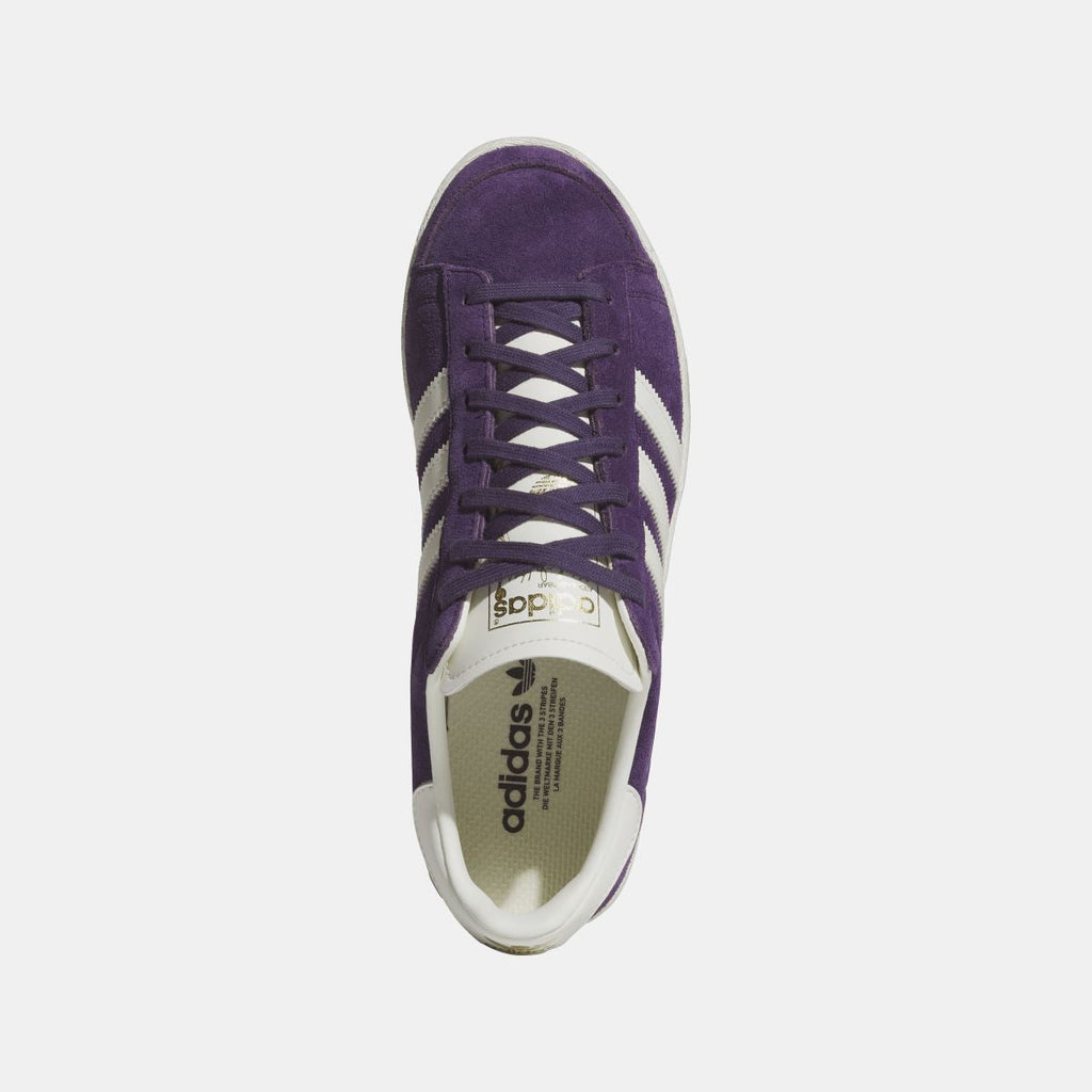 Purple adidas Originals Jabbar Lo sneaker front view with lace-up closure and white outsole