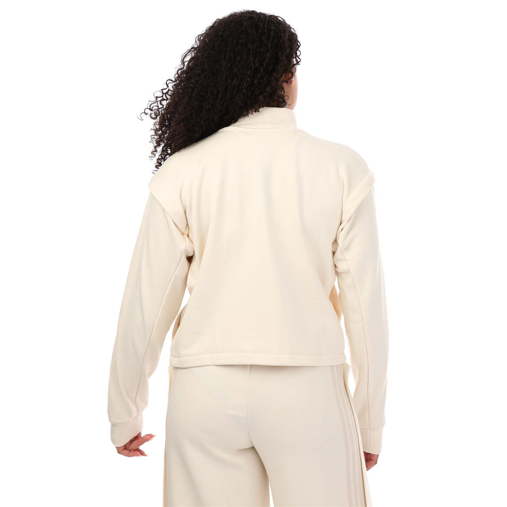 Cream crewneck sweatshirt back view with ribbed hem and long sleeves