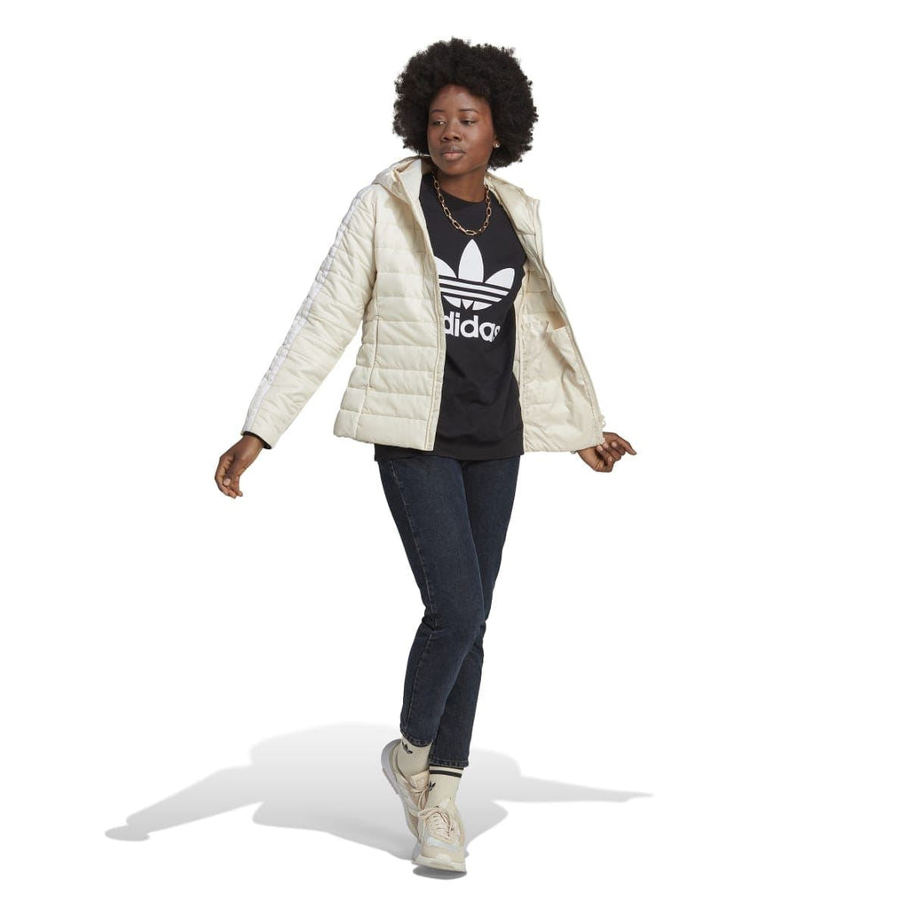 Off-white hooded puffer jacket worn over a dark graphic top, slim fit