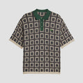 adidas Originals polo shirt in sand with dark geometric pattern and green button placket