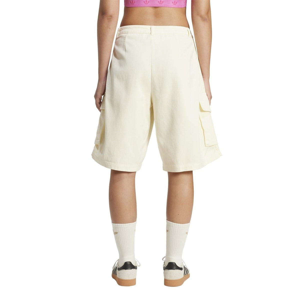 Cream white denim cargo shorts with back and side flap pockets and knee-length hem