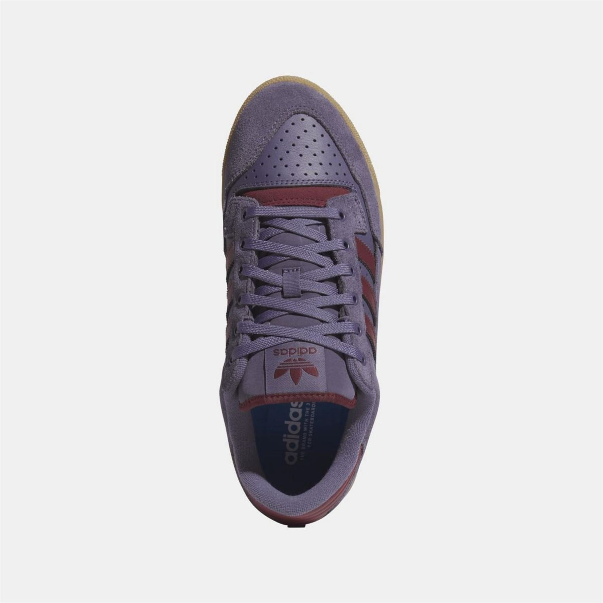 adidas Originals 85 Low ADV sneakers in black with white accents, showcasing classic low-top athletic footwear design