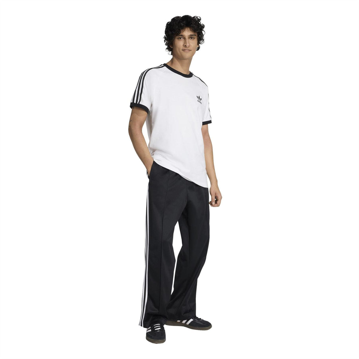 adidas Originals track pants, black with white stripes and relaxed straight-leg fit