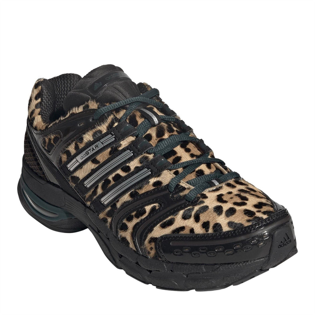 adidas Adistar Control 5 shoes in black with leopard print toe and teal accent midsole