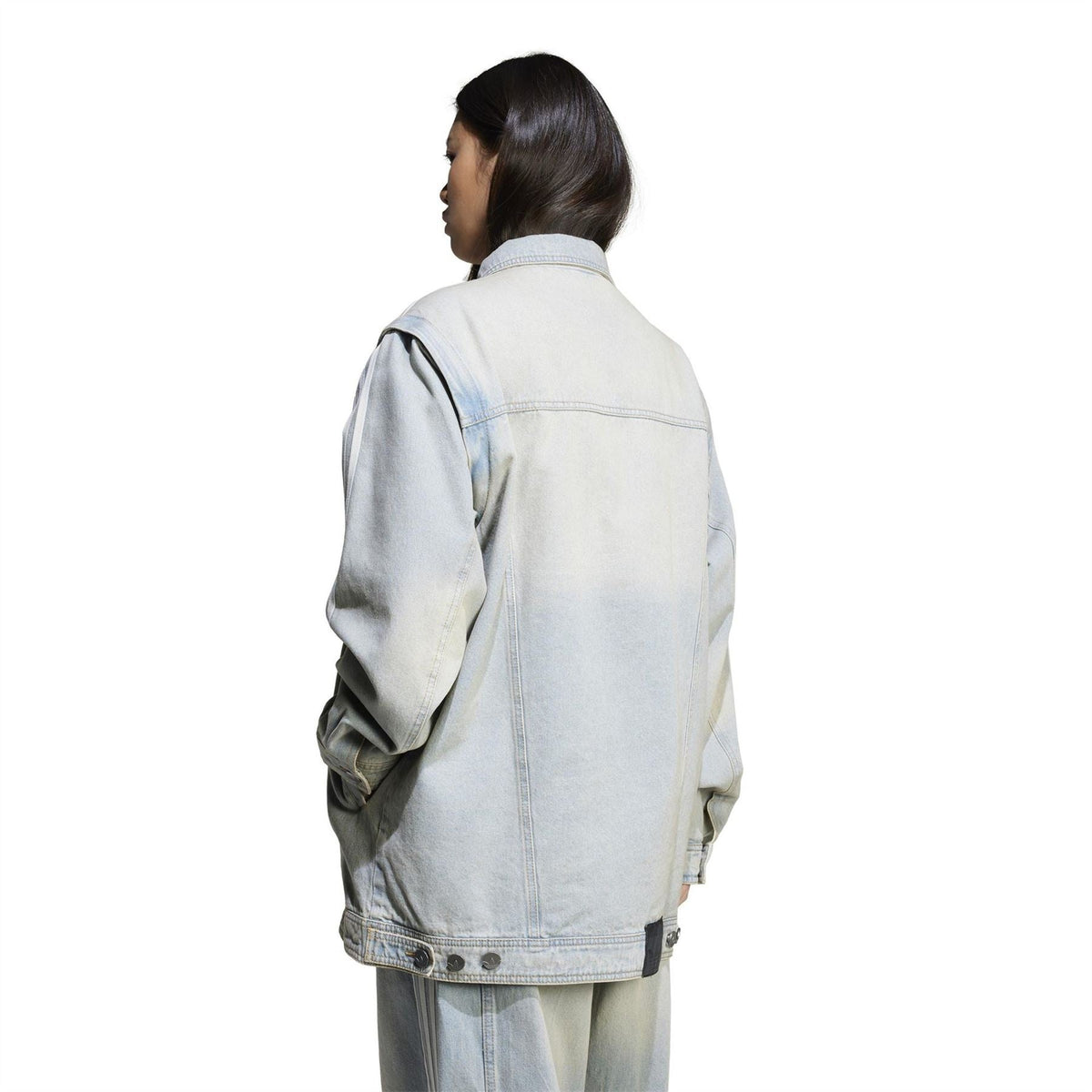 adidas Originals light denim collared jacket back view with button front and side stripes