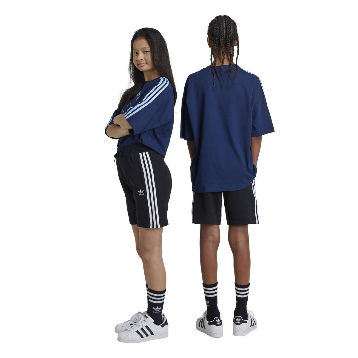 Black adidas sweat shorts with white side stripes and elastic drawstring waistband