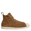 Brown suede high-top sneakers with cream sole, lace-up and perforated toe
