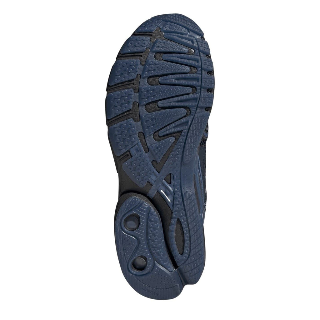 Dark blue adidas Originals lace-up sneaker outsole tread with rubber traction pattern