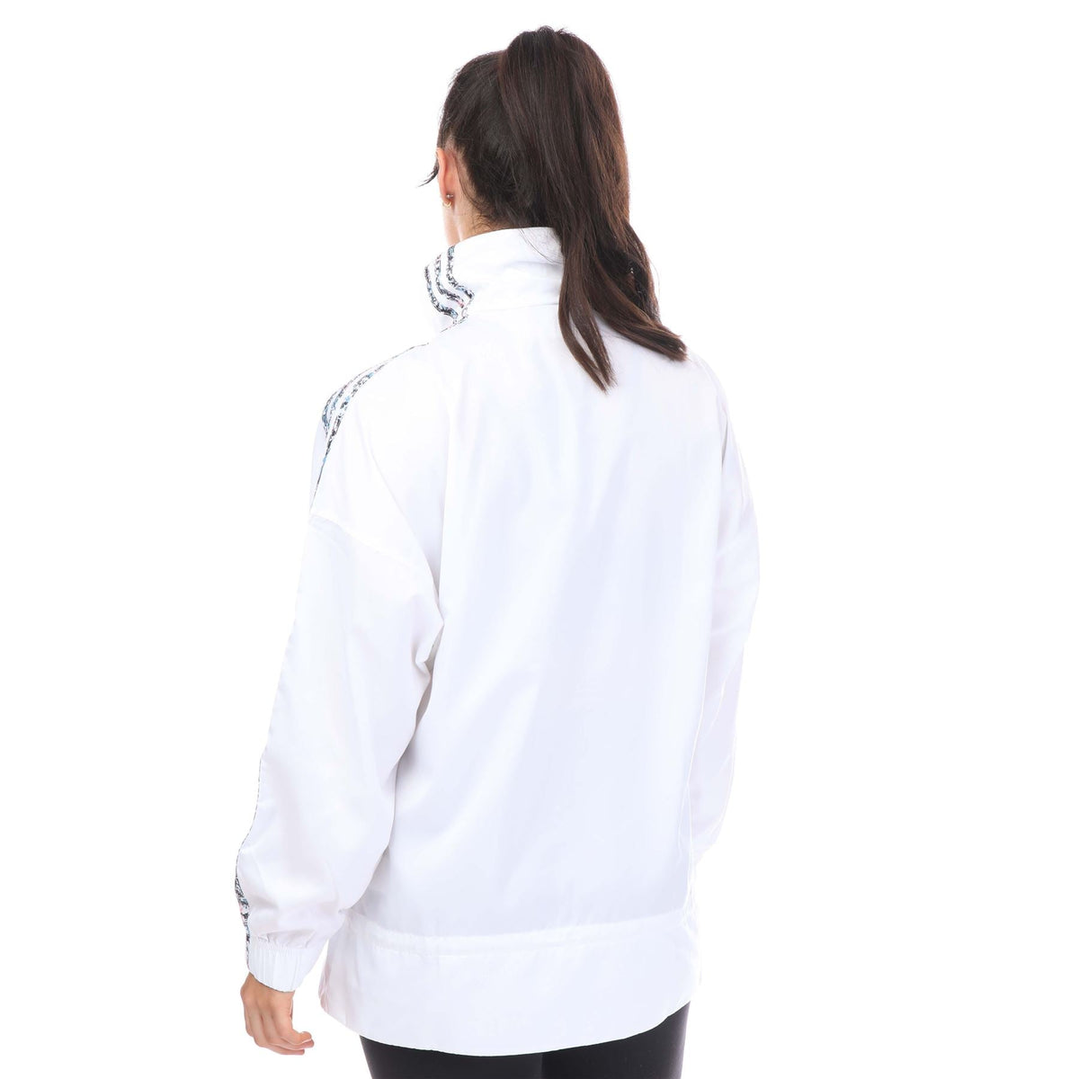 Half-zip windbreaker jacket with white back and patterned stripe detail on sleeves