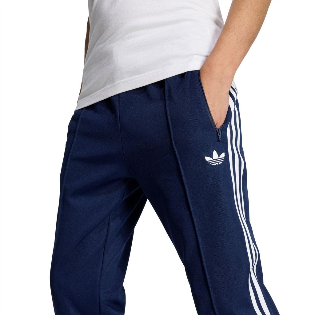 adidas Originals Beckenbauer pants in navy with white side stripes and trefoil logo