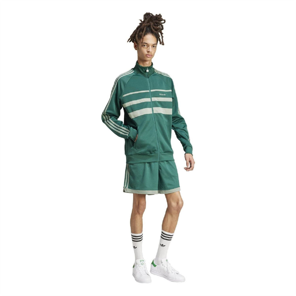 adidas Originals tracksuit top featuring a classic design with a zip front and logo detailing, perfect for casual wear