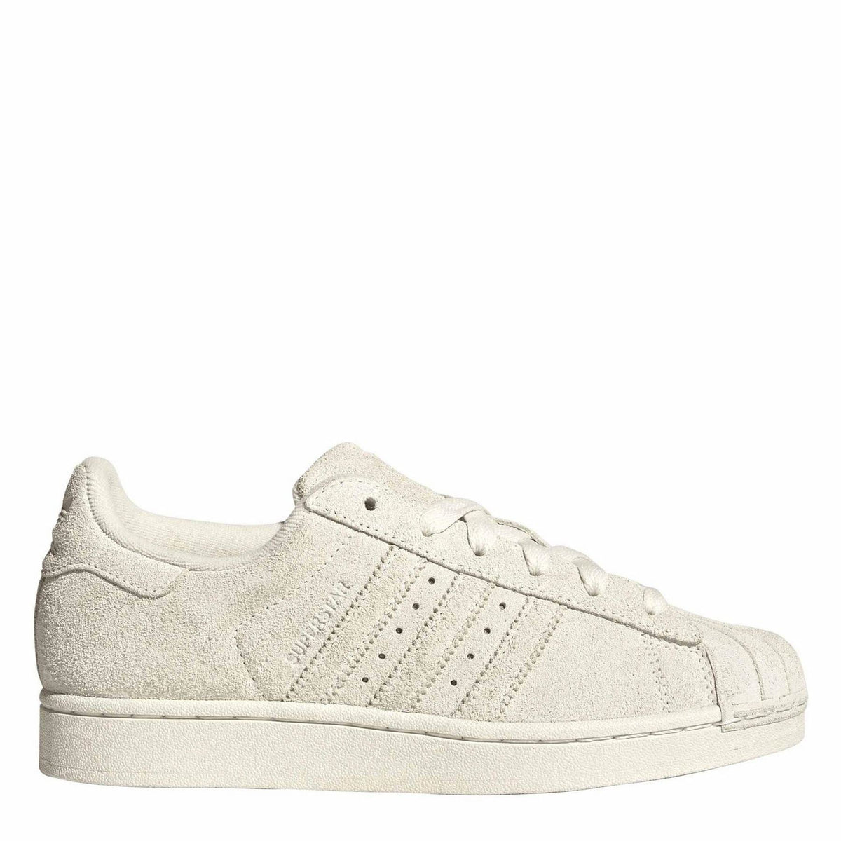 Light cream suede low-top sneakers with three side stripes and lace-up design