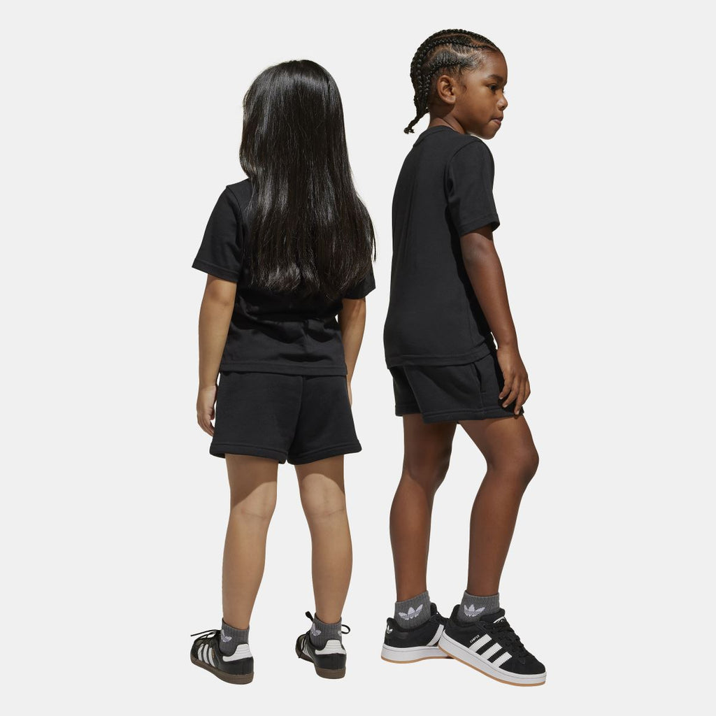 Black juniors T-shirt and shorts set on child, back view