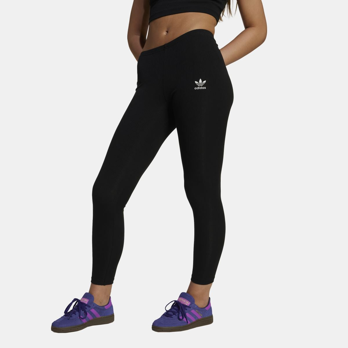 Black ribbed juniors leggings with adidas trefoil logo on thigh, pull-on fit