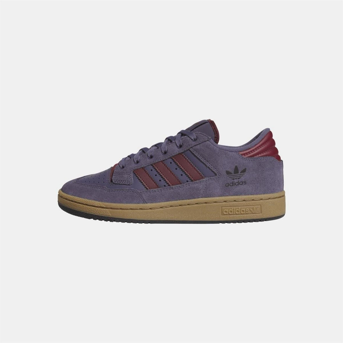 adidas Originals 85 Low ADV shoes in black and white with classic low-top design and adidas logo on the side.