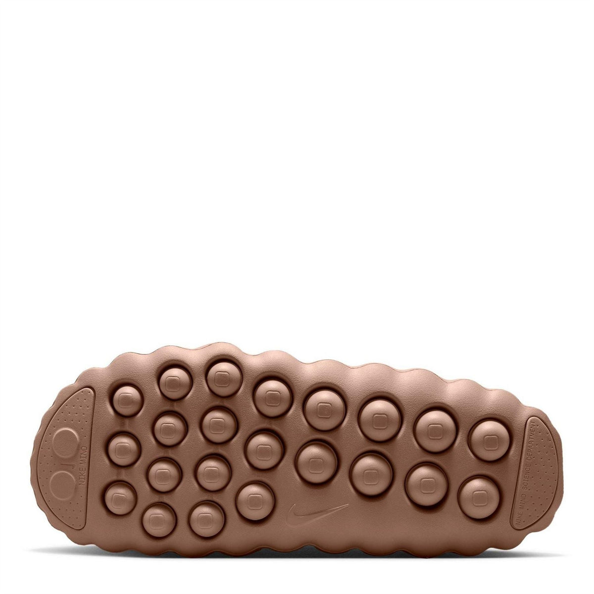 Tan rubber outsole with circular traction nubs for grip
