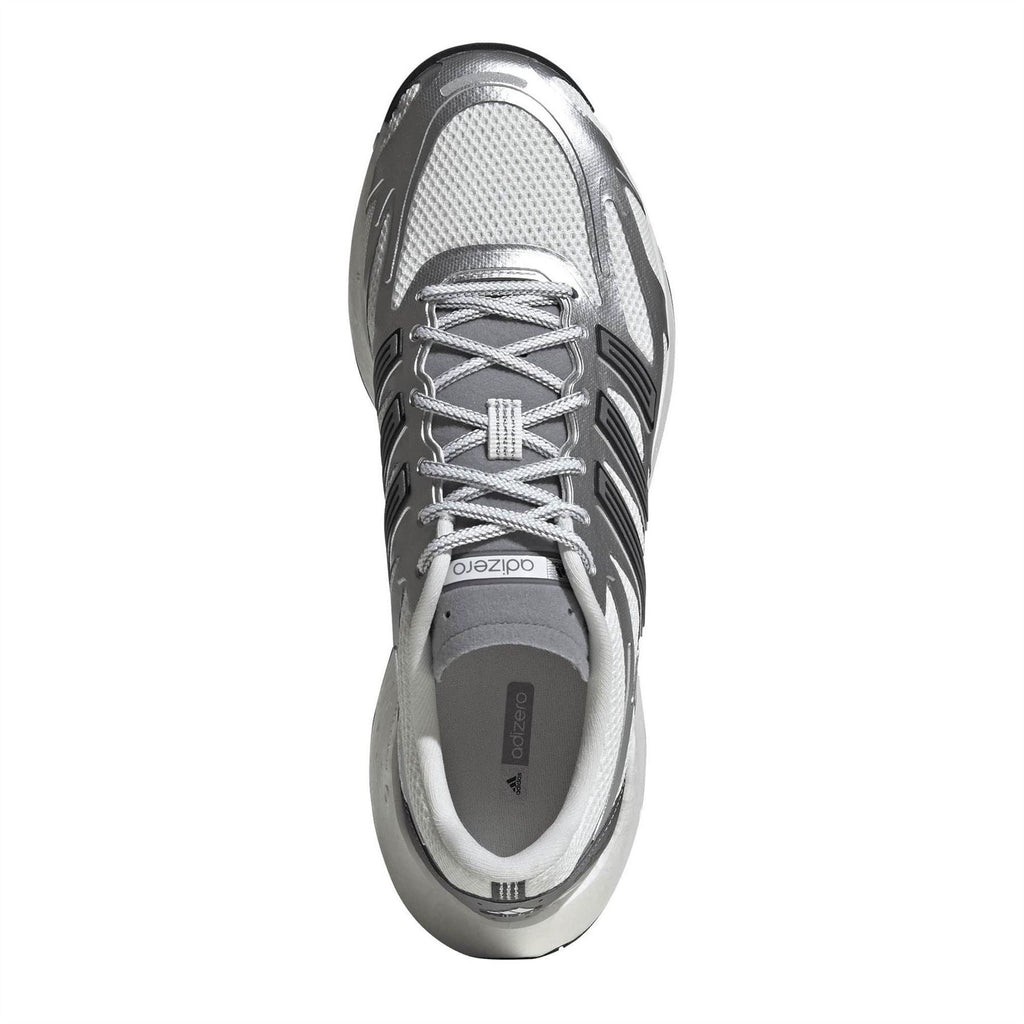 Silver lace-up running shoe with mesh upper and dark trim at toe and heel