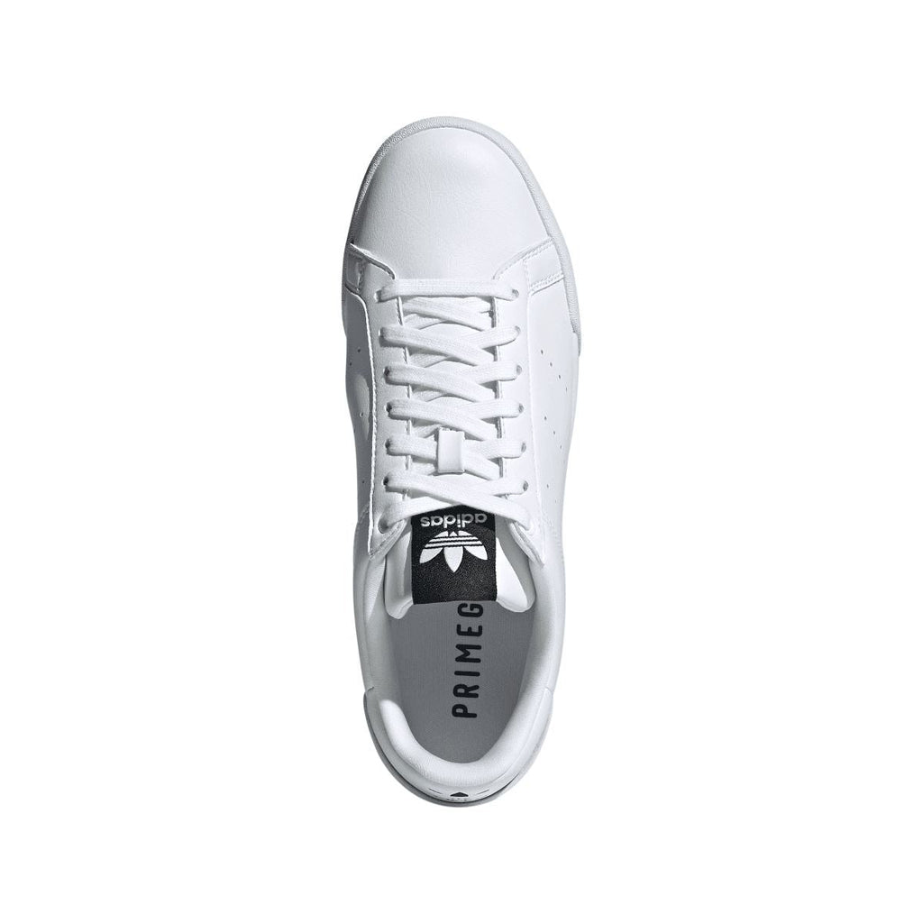 White adidas Originals Court Tourino trainer, lace-up front, cushioned collar, logo tongue label.