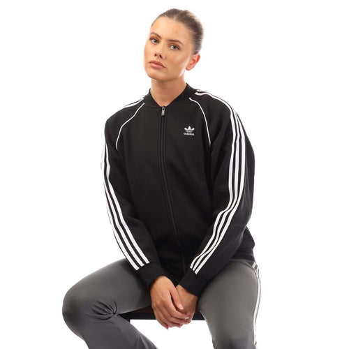 Black fleece bomber jacket with full zip, stand collar, and white 3-Stripes sleeves