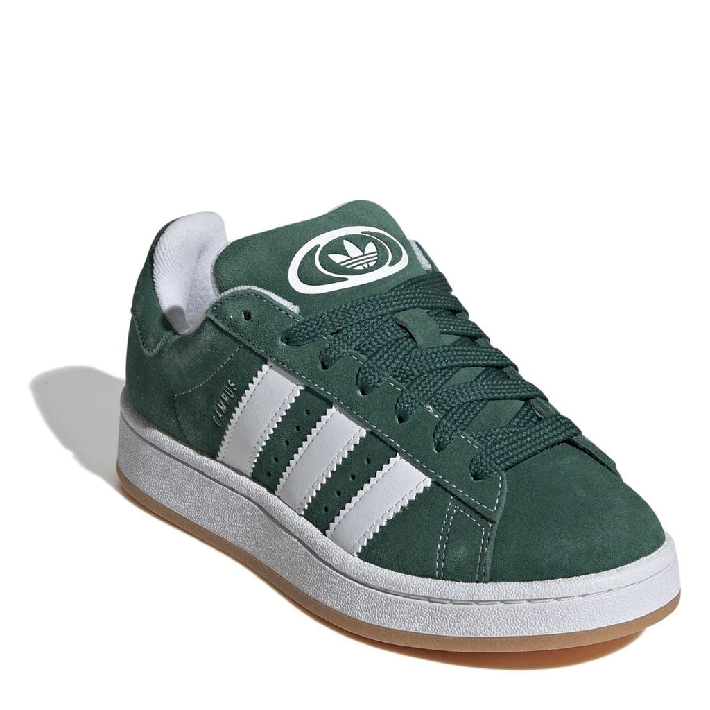 Juniors green suede trainers with white three stripes and Trefoil-style logo on tongue.