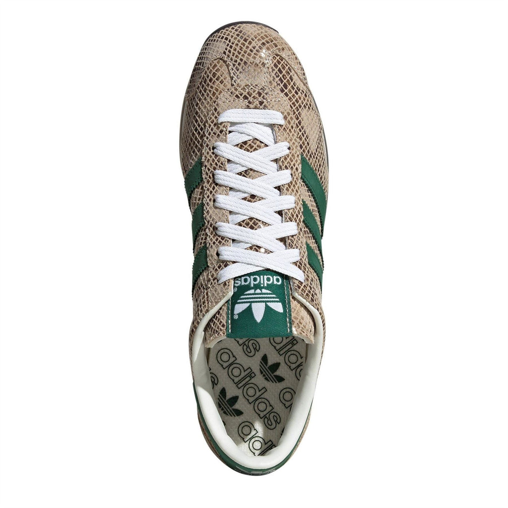adidas Originals sneaker toe view, beige woven upper with green stripe panel
