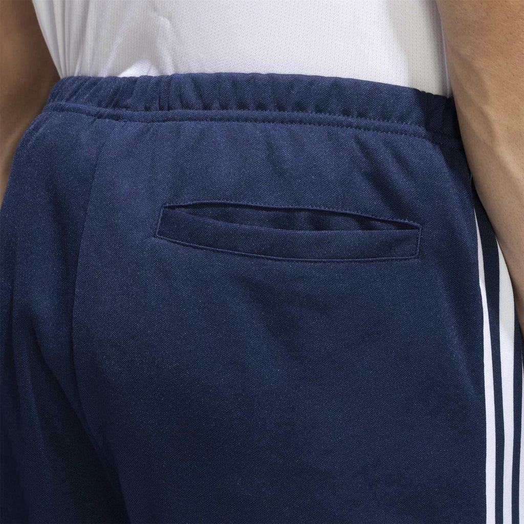adidas track pants pocket detail: navy front zip pocket with white stripe edge