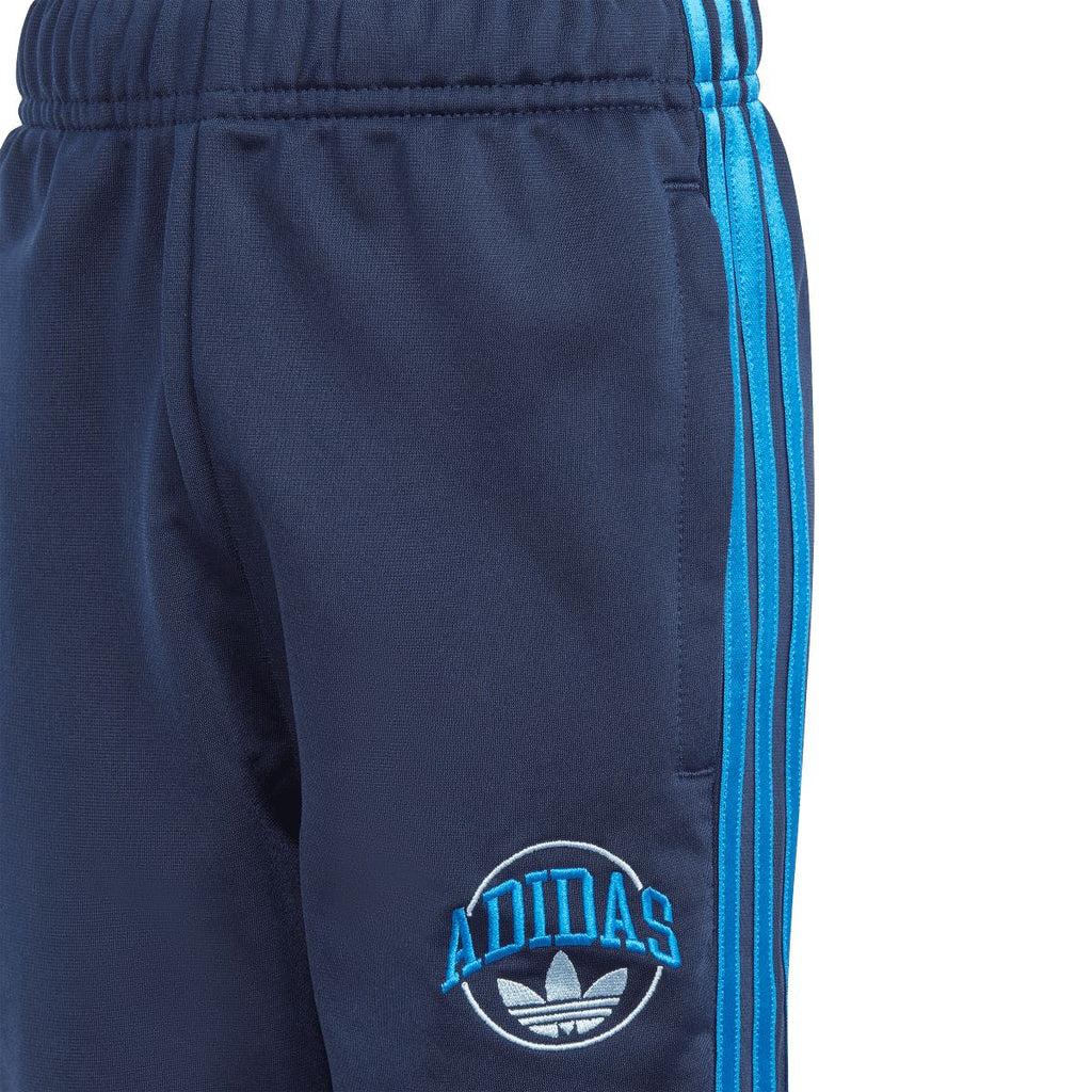 Infant adidas indigo jogger pants with blue side stripe and small adidas logo patch