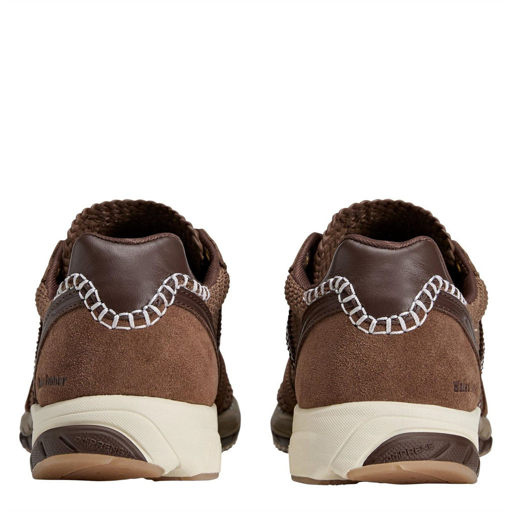 Brown suede-trim running shoes with white laces and cream heel tab, back view.