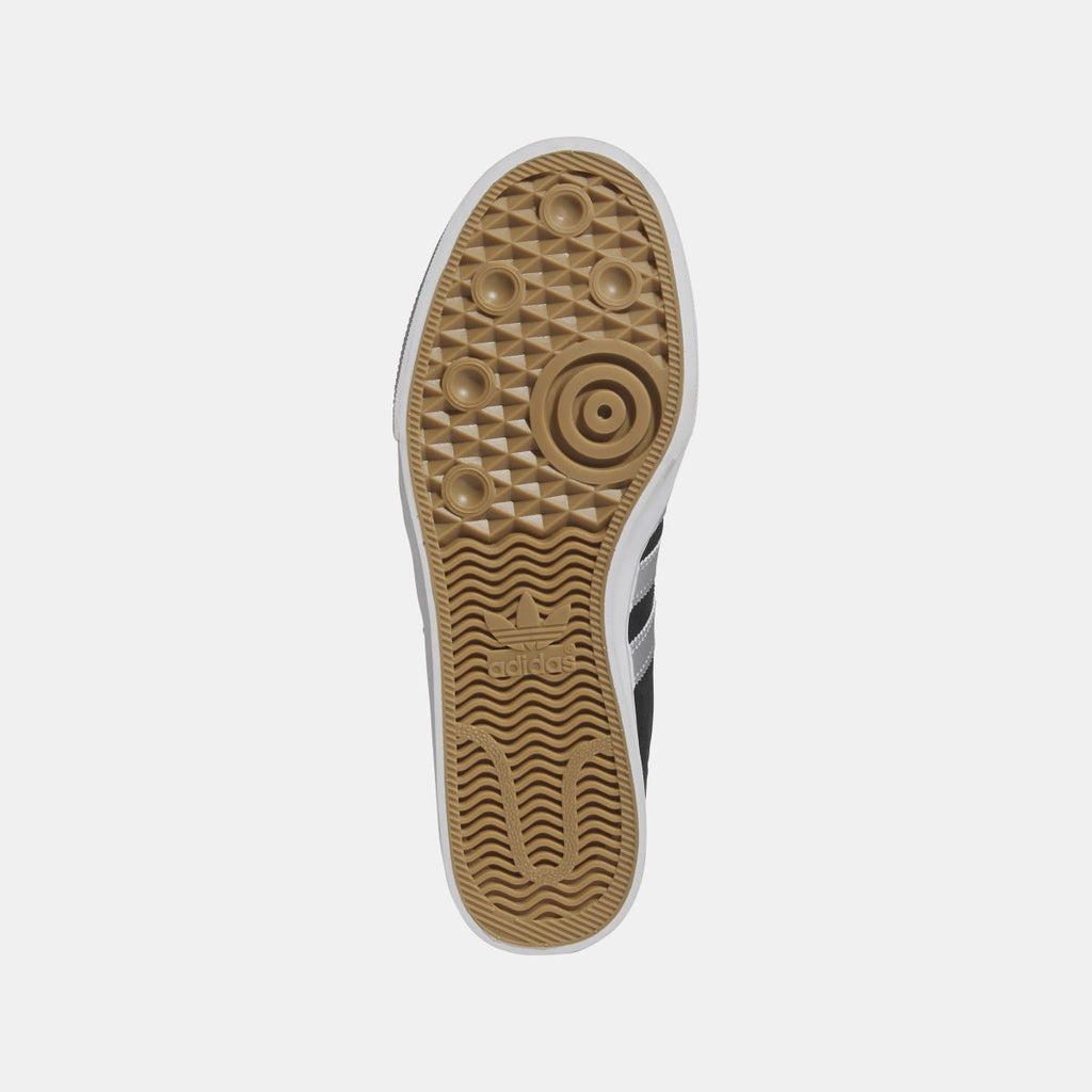 adidas Originals Adi Ease black sneaker outsole with textured grip and white edge
