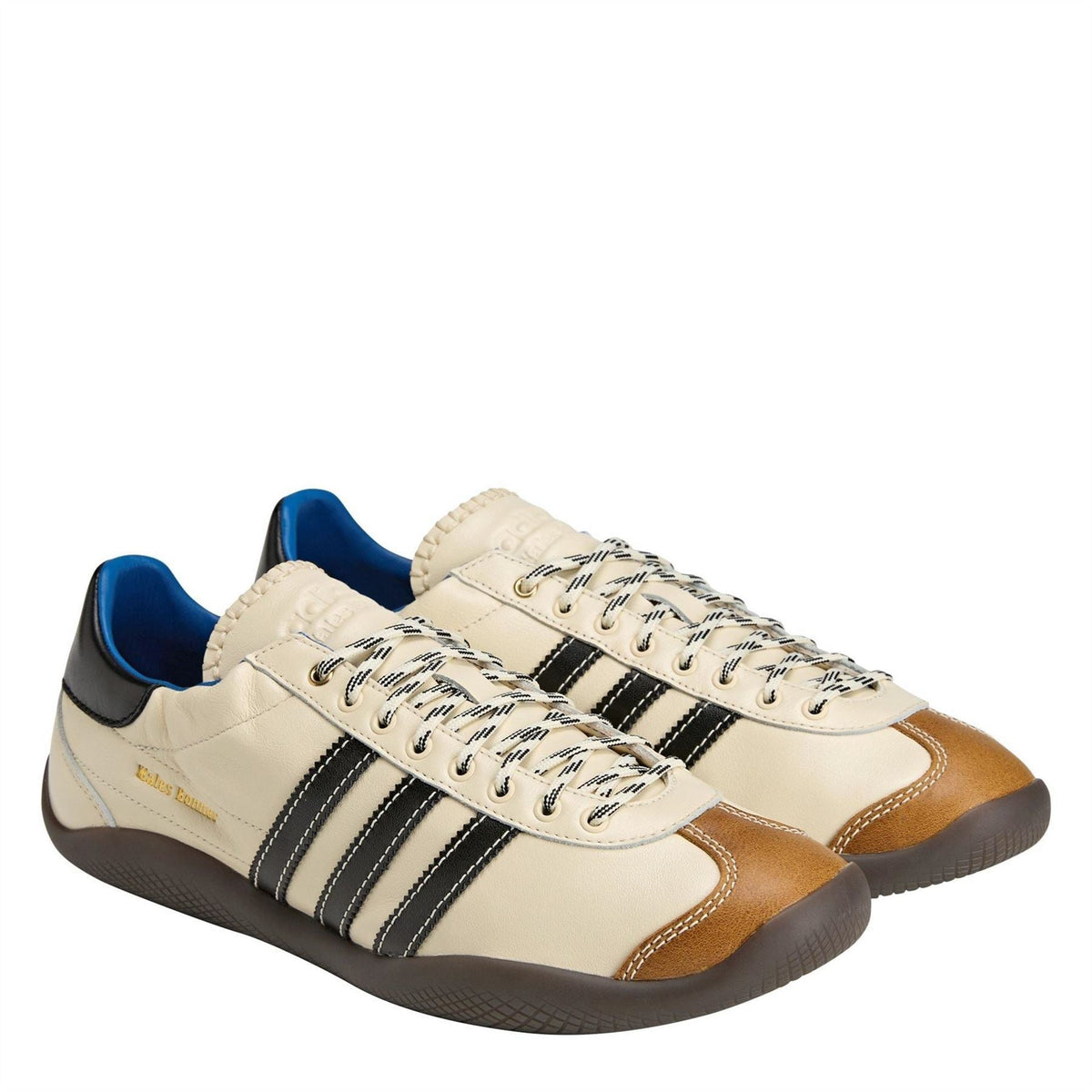 adidas Originals low-top sneakers, cream and brown with black stripes and blue collar lining