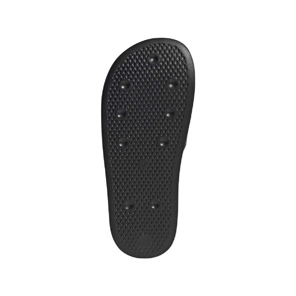Black textured outsole footbed for slide sandals