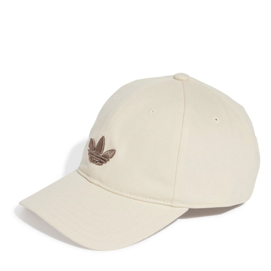 Light beige dad cap with curved brim and embroidered logo on front panel