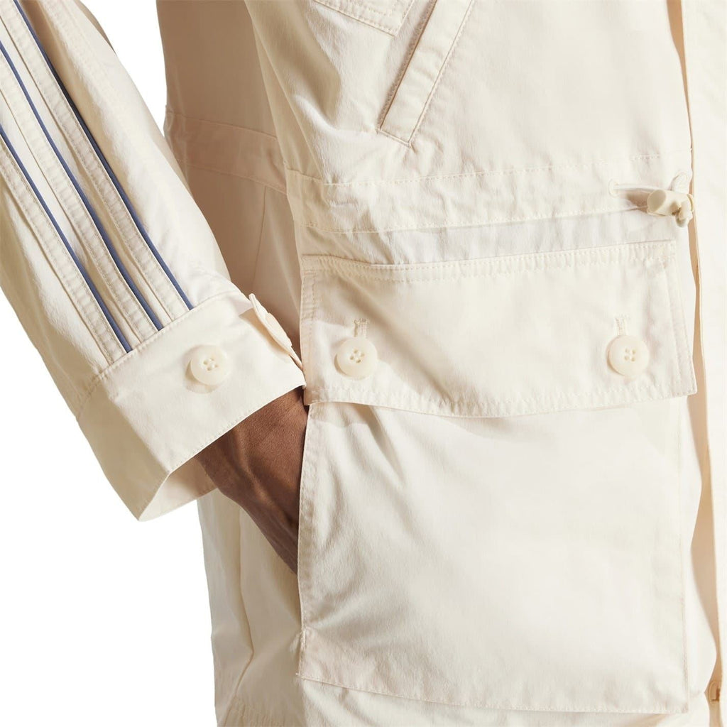 adidas Originals windbreaker jacket with external pocket, lightweight coat with logo, black fabric, casual outdoor wear