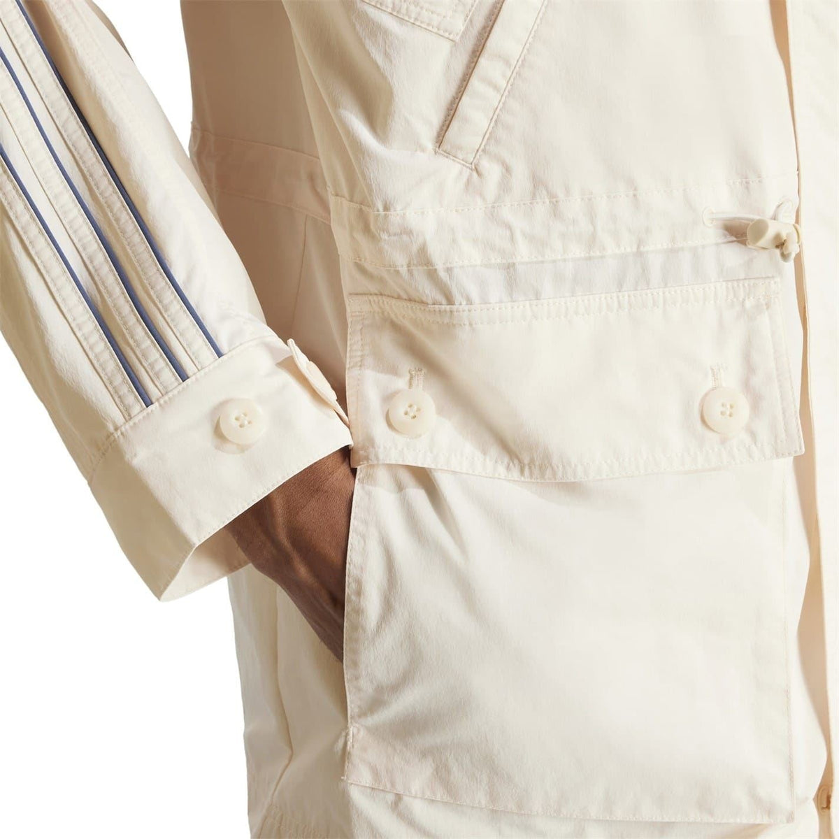 adidas Originals windbreaker jacket with external pocket, lightweight coat with logo, black fabric, casual outdoor wear
